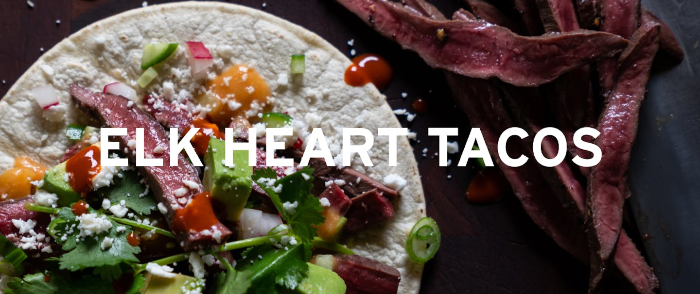 Elk heart meat taco with cilantro and avocado and cotija cheese